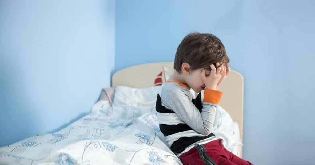 My child still wets the bed. At what age should I be concerned?